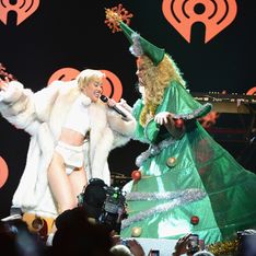 Miley Cyrus has holiday spirit: Star passes out in Christmas card photo after Jingle Ball