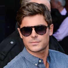 Zac Efron shows off six month sobriety chip