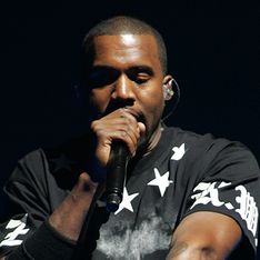 Kanye West has apparently attacked an 18-year-old over racial slurs