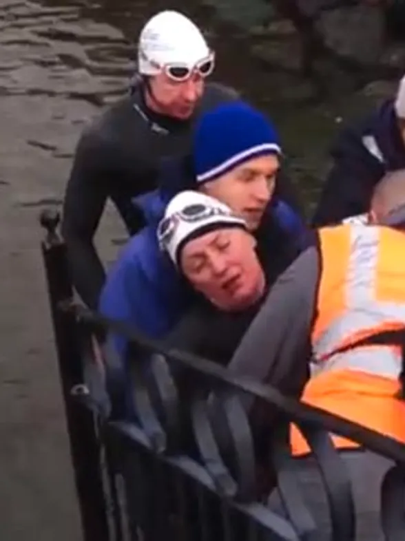 An exhausted Davina McCall is dragged out of lake during Sport Relief challenge