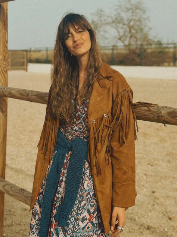 Decathlon rebaja las botas con cuña más trendy de Skechers que suman altura y quedan ideales con vestido boho holgadito
